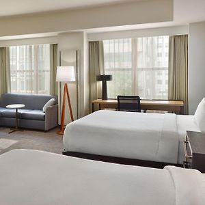 Studio Two Queen Beds Sofa Bed